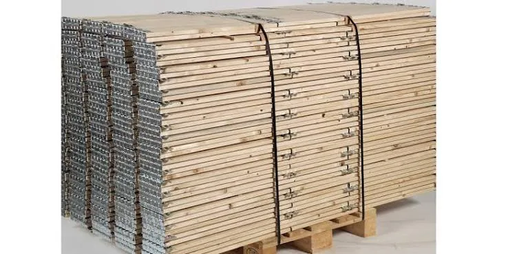 Folded wooden pallet collars bundled on pallets for storage